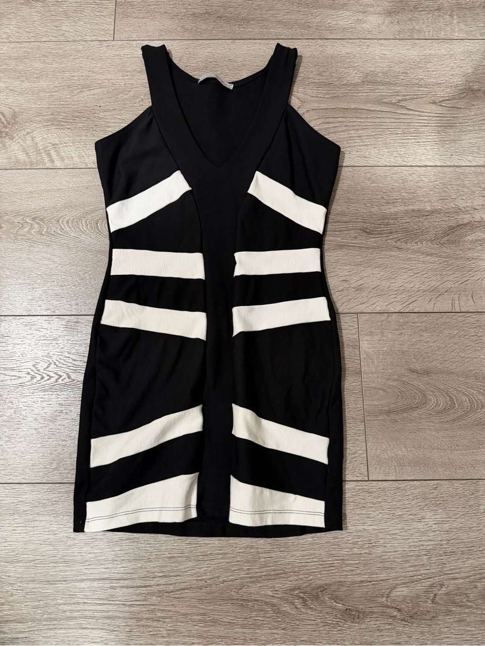 Sleeveless Black Mini Dress with White Stripe Accents